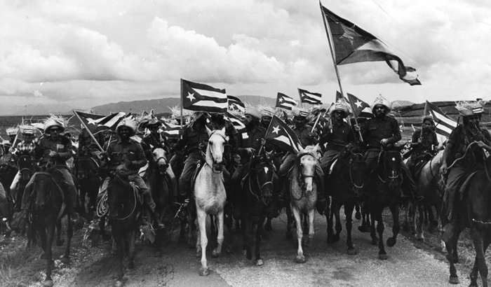 Kubanische Revolutionäre zu Pferde 1959